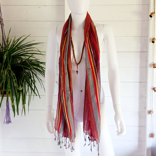 Immerse yourself in the alluring world of bohemian fashion with this delicate Indian Boho Scarf. Crafted with care, each scarf captures the essence of India's free-spirited charm, adding a touch of Boho elegance to your outfit. Whether draped effortlessly over your shoulders, wrapped as a headscarf, or styled with creative knots, this versatile accessory enhances your everyday fashion. Lightweight, breathable, and full of personality, it’s the perfect way to express your unique style.