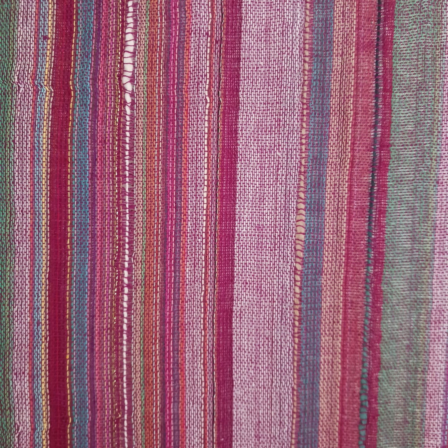 Immerse yourself in the alluring world of bohemian fashion with this delicate Indian Boho Scarf. Crafted with care, each scarf captures the essence of India's free-spirited charm, adding a touch of Boho elegance to your outfit.