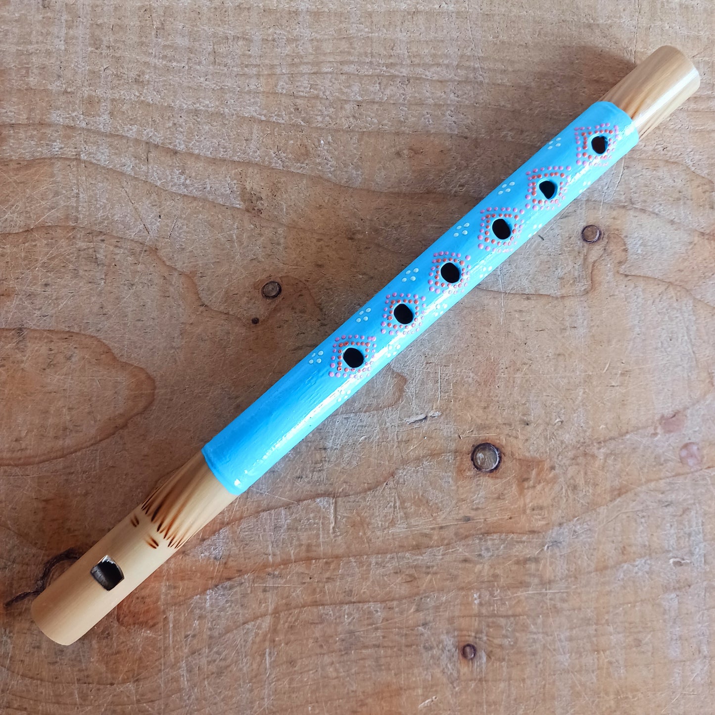 Introduce your little ones to the joy of music with these handcrafted pastel bamboo flutes. Available in three pretty colours, these fair trade instruments are an affordable and eco-friendly way to spark creativity, encourage musical play, and provide a delightful alternative to screen time. Each flute is carefully made from natural bamboo and hand-painted by skilled artisans, making every piece unique. Perfect as a gift or as a fun addition to your child’s toy collection.