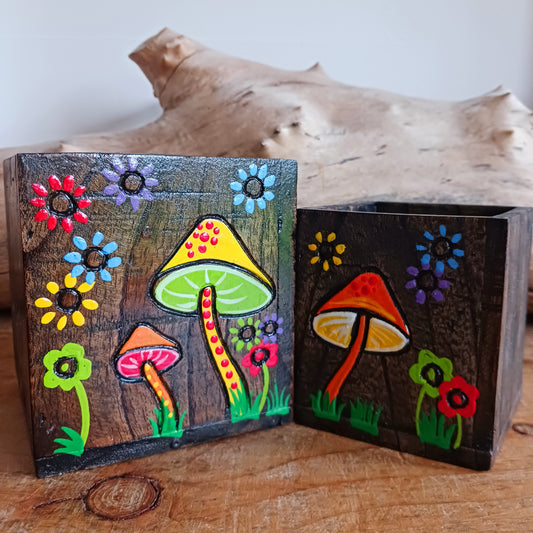 Add a burst of colour and joy to your space with this Hand Painted Mushroom Wooden Pots Set, handmade in Indonesia and Fairtrade certified. Each pot is carefully painted by skilled artisans, making every set unique and full of character.