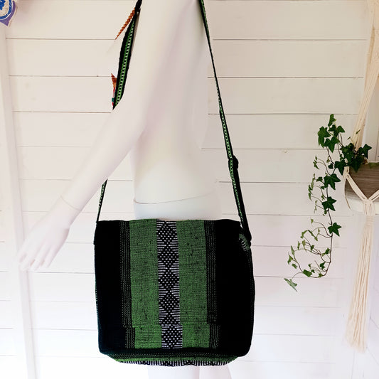 Inspired by the Spanish word for "colourful," this Vistoso Satchel brings vibrant style and practical design together. Available in a variety of bold and eye-catching patterns, this satchel comes in lovely shades of green and is both fashionable and functional. The spacious main zipped compartment comfortably fits a small laptop or notebook, while the additional front zipped pocket keeps essentials within easy reach.