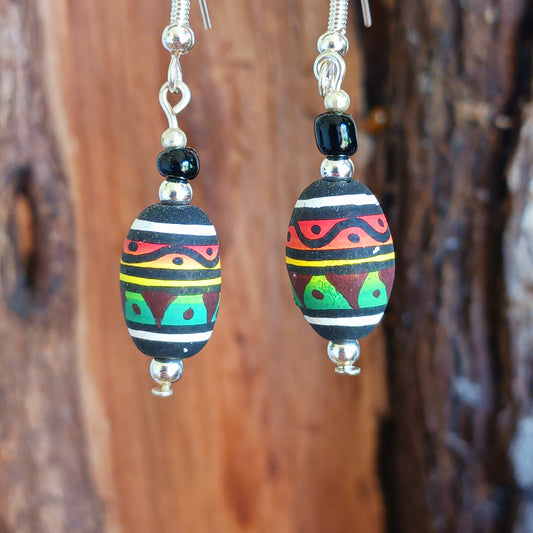 These cool Rasta earrings have silver plated hooks and are handmade in the UK using hand painted, round Peruvian Cusco beads.