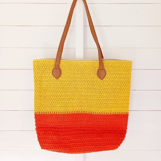 Brighten up your day with this beautifully vibrant Bazaar Bag — your perfect everyday companion. Whether you're heading to the market, beach, or gym, this spacious bag is designed to carry it all, from groceries to beach towels. It features two sturdy shoulder straps for comfort, a secure zip-top fastening to keep your items safe, and a handy interior pocket for smaller essentials. Stylish, practical, and built for daily use everywhere!
