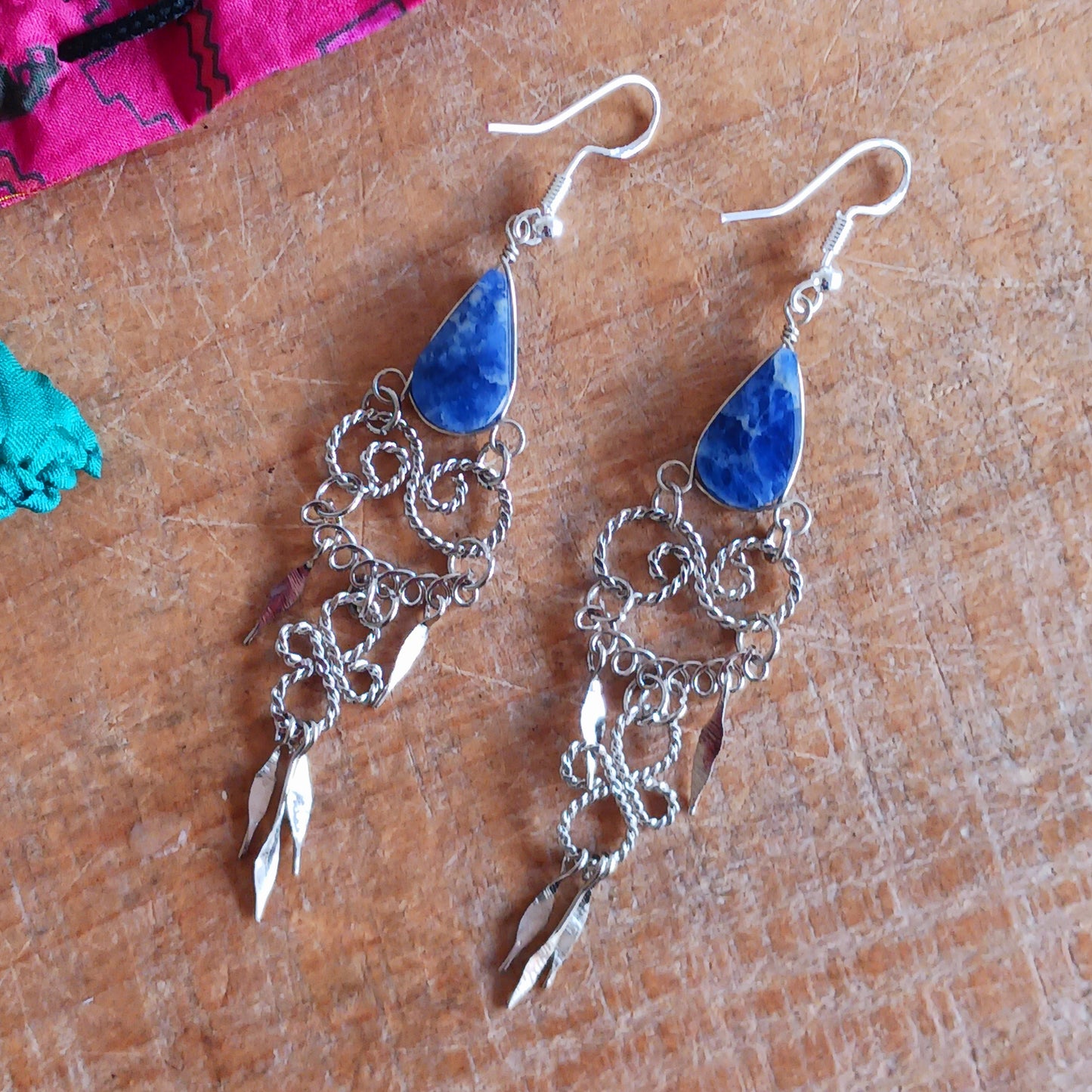 Add a touch of bohemian beauty to your look with these handmade Peruvian stone earrings. Featuring lapis lazuli stones and finished with silver-plated hooks, each pair is carefully crafted in small workshops in Peru.