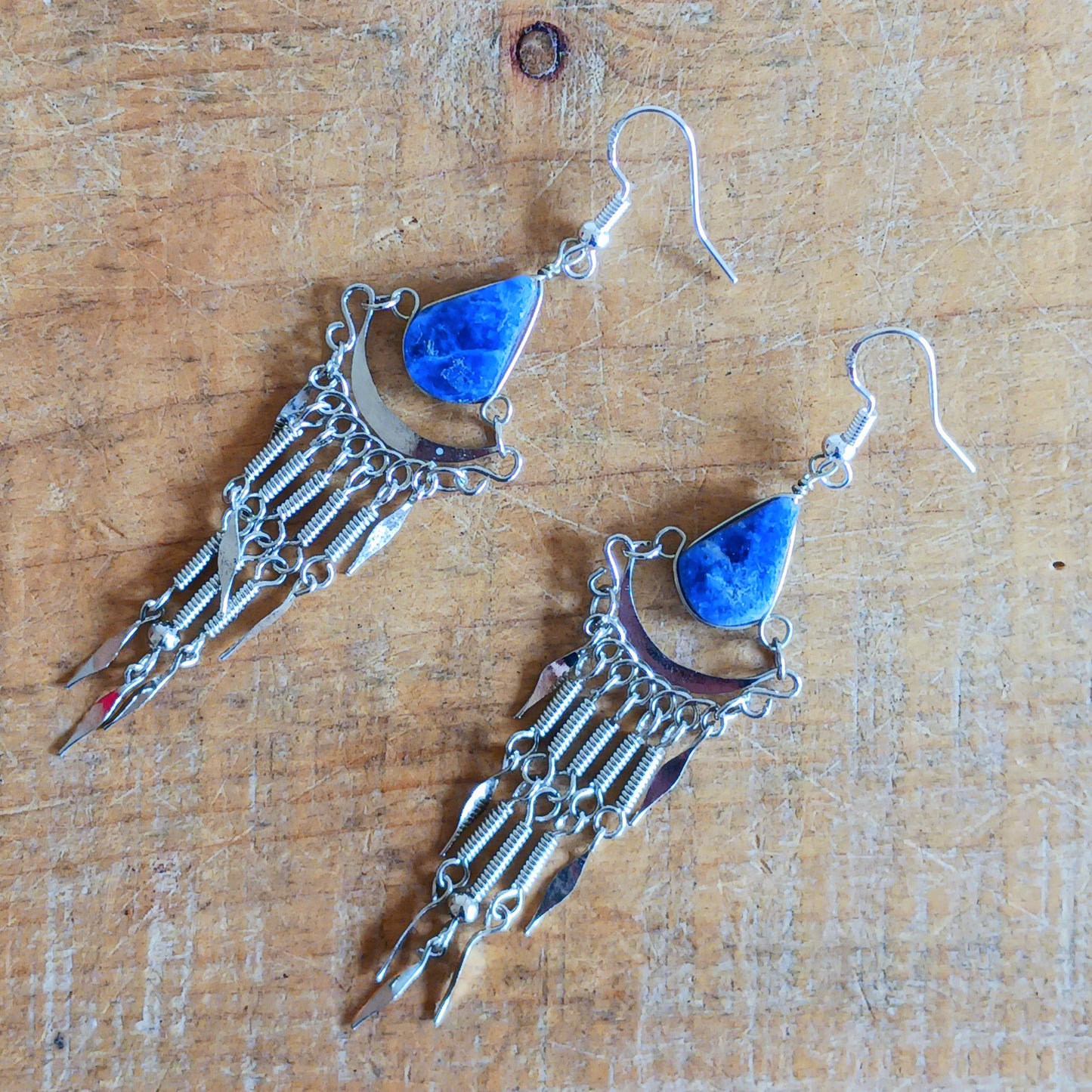 Add a touch of bohemian beauty to your look with these handmade Peruvian stone earrings. Featuring lapis lazuli stones and finished with silver-plated hooks, each pair is carefully crafted in small workshops in Peru.