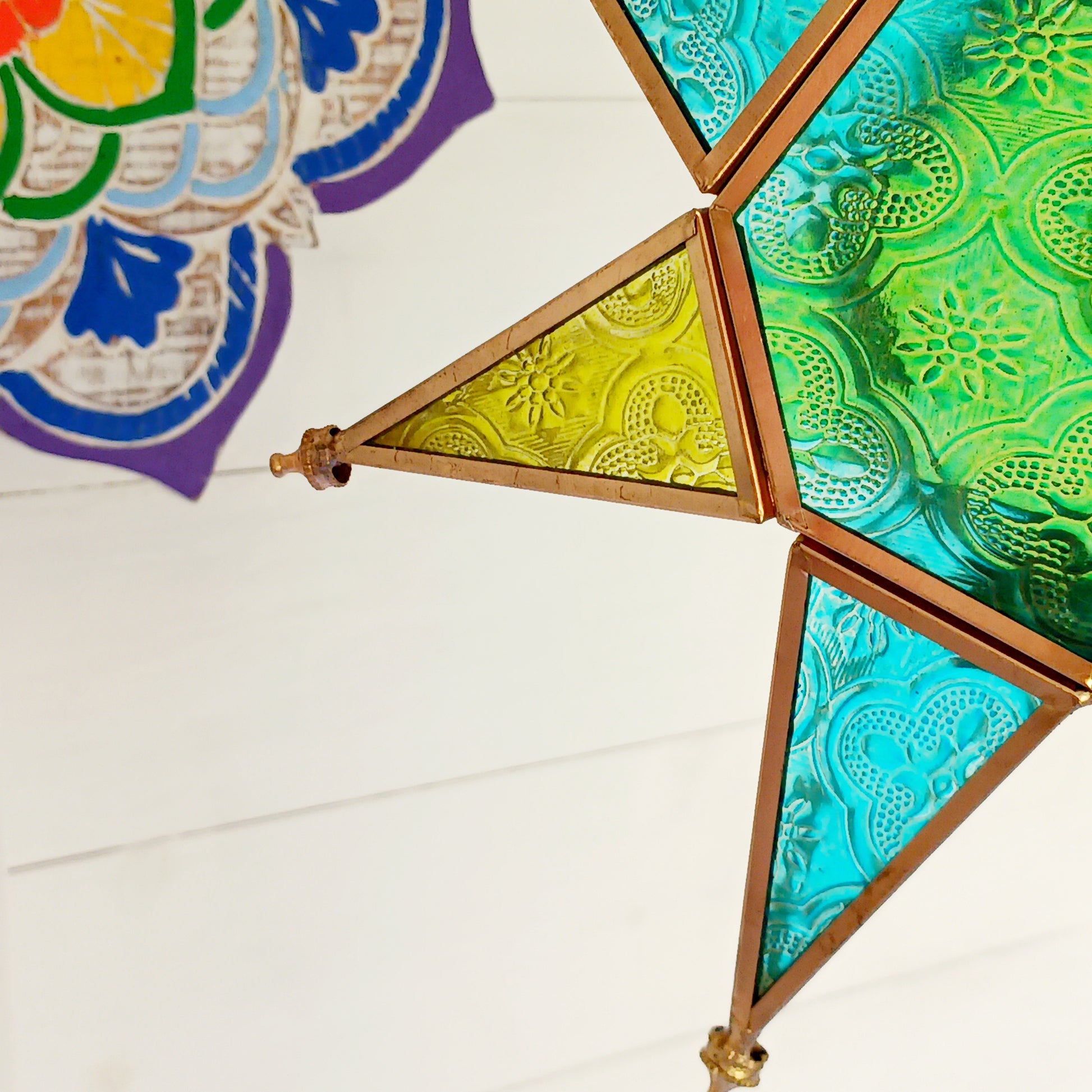 These Moroccan style star glass lanterns are handcrafted by skilled artisans and come in beautiful rich colours that catch the eye and instantly add atmosphere to any room.