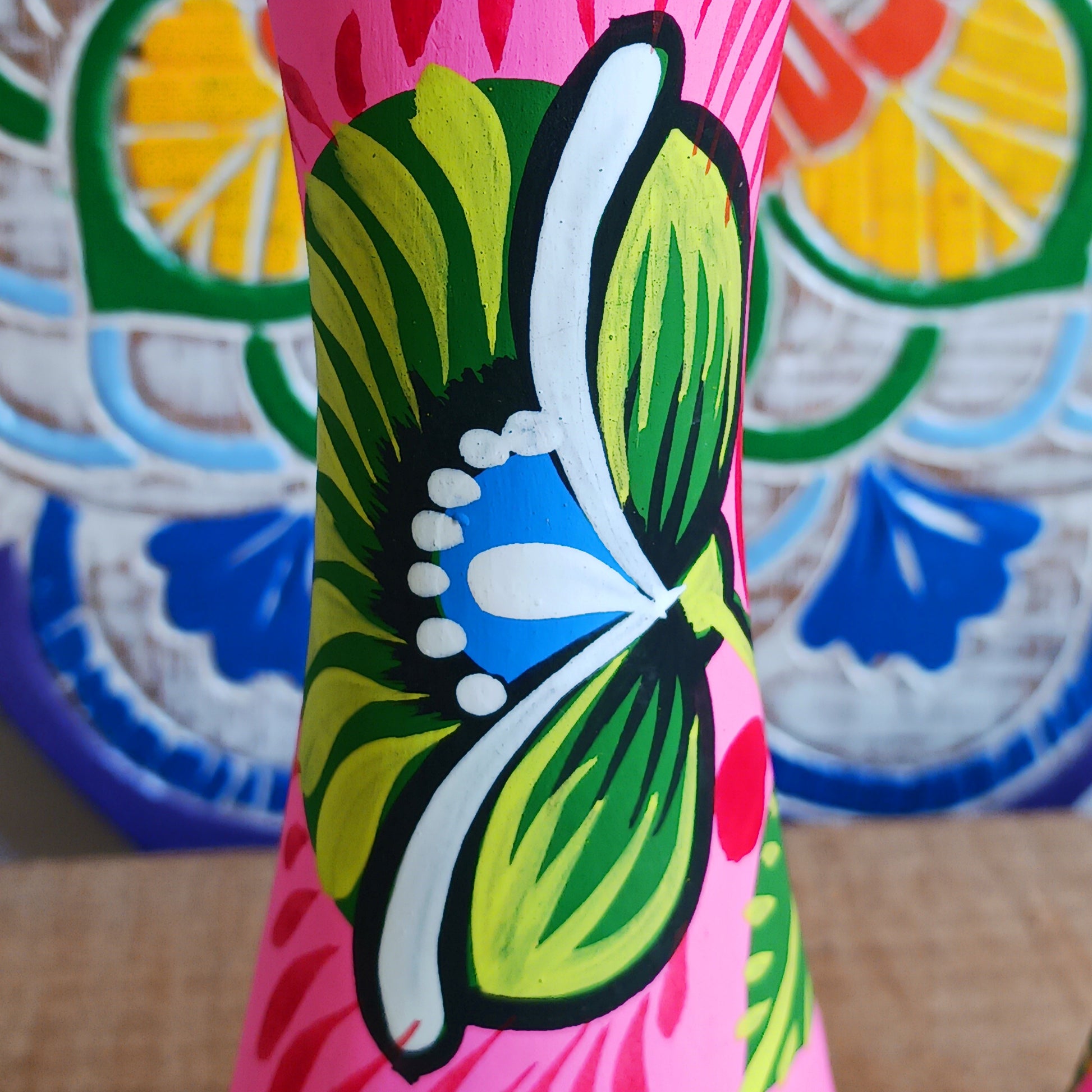 Hand painted in a vibrant&nbsp;pink&nbsp;hue and adorned with the Shapla (waterlily) flower — the national flower of Bangladesh, this fair trade candle holder is a true statement piece. Display it prominently or gift it to someone special as a unique, ethical, and meaningful present. Beautiful on its own or paired with others, it adds warmth, tradition, and cheerful design to any space.