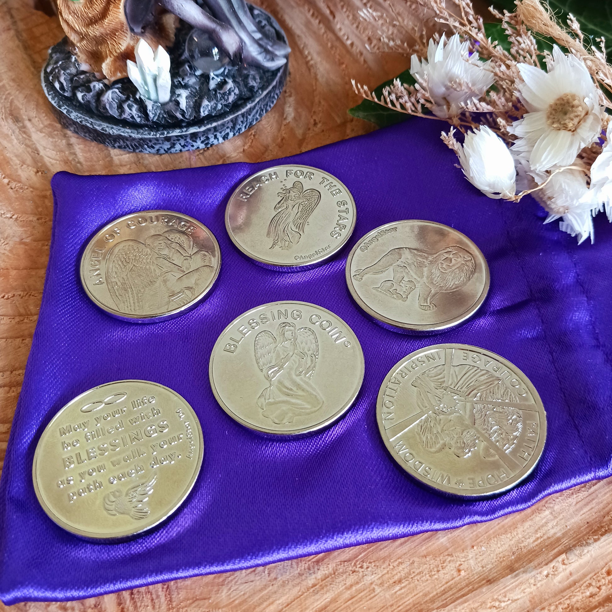 This Blessing Angel coin, whether given or received, conveys its angel blessing on you.  The front of the coin shows a kneeling angel with the inscription Blessing Coin. The reverse depicts a dove and the message "May your life be filled with Blessings as you walk your path each day".