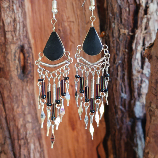 These beautiful earrings incorporate Black Tourmaline Stone with Silver plated hooks. They have been hand made in Peru and are presented in a traditionally made pouch, gift wrapped and ready to give☸