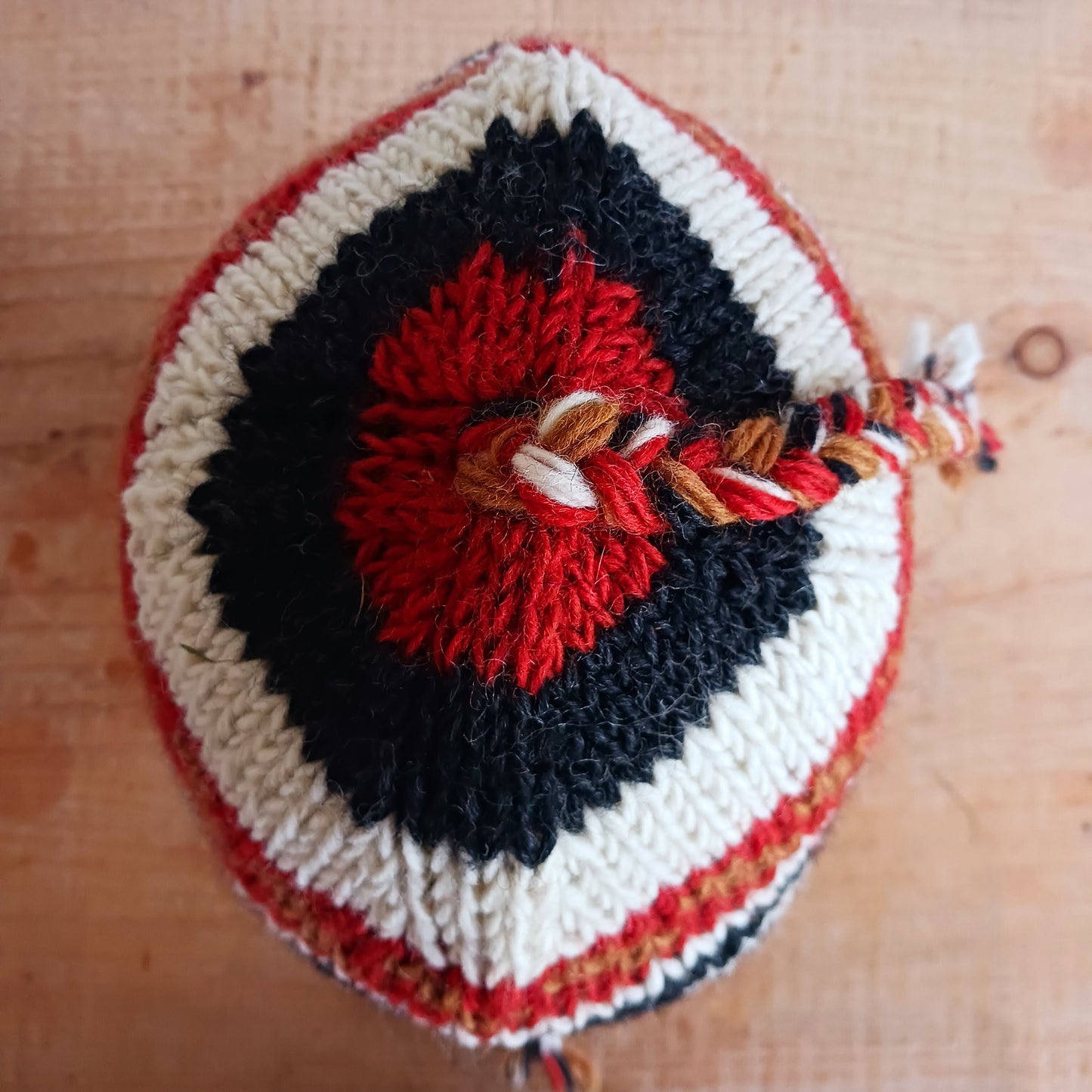 Stay cozy and stylish with our handmade chunky wool earflap hats, crafted in Nepal by skilled women artisans in Kathmandu. Each hat is 100% pure wool and features a soft polar fleece lining for extra warmth and comfort. Perfect for cold winter days, outdoor adventures, or adding a touch of handmade charm to your look.