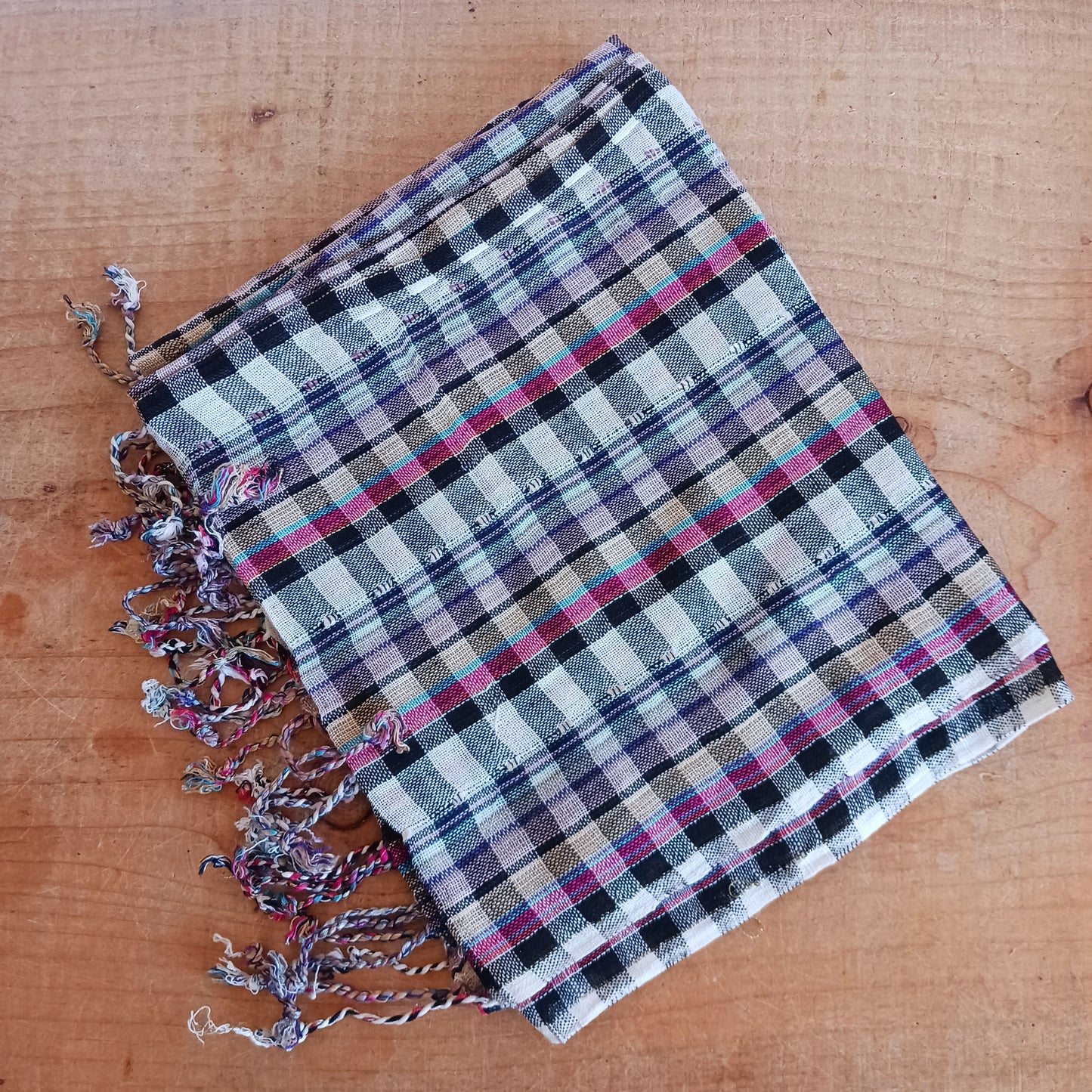 Immerse yourself in the alluring world of bohemian fashion with this delicate Indian Boho Scarf. Crafted with care, each scarf captures the essence of India's free-spirited charm, adding a touch of Boho elegance to your outfit.