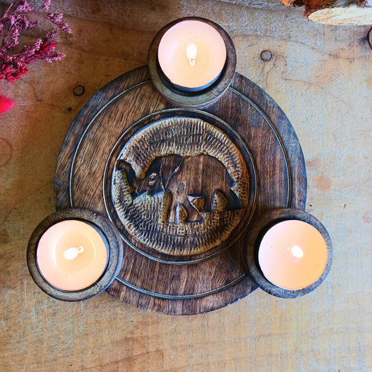 Add warmth, charm, and timeless style to your space with this beautifully hand carved wooden elephant tealight holder. Crafted from natural wood, each piece features unique grain patterns and rich brown tones, making every holder truly one of a kind.