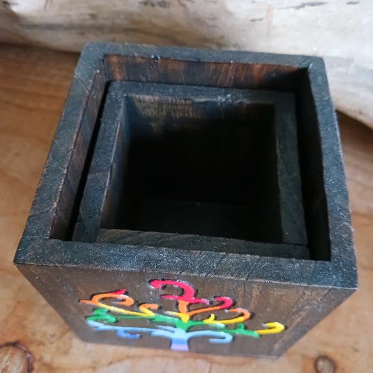 Add a burst of colour and joy to your space with this Hand Painted Tree and Flower of Life Wooden Pots Set, handmade in Indonesia and Fairtrade certified. Each pot is carefully painted by skilled artisans, making every set unique and full of character.