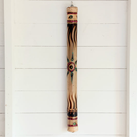 Bring the soothing sound of rainfall into your home with this beautifully handcrafted bamboo rainstick. Made using a hollow length of natural bamboo, this traditional percussion instrument creates a calming rain-like sound effect that is perfect for meditation, sound healing, relaxation, music sessions, classrooms, or unique home décor.