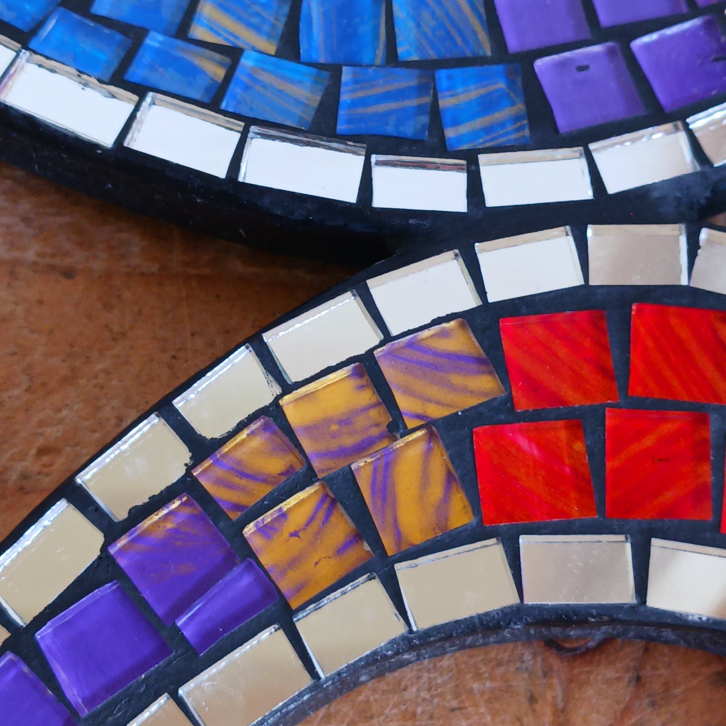 Bring serenity and colour into your sacred space with our&nbsp;Rainbow Mosaic Om Wall Plaque. This stunning piece features a vibrant rainbow design representing the powerful Om symbol — a timeless emblem of inner peace, spiritual connection, and mindfulness. Perfect for meditation rooms, yoga studios, or as a thoughtful gift, this plaque adds both beauty and positive energy to any home décor.