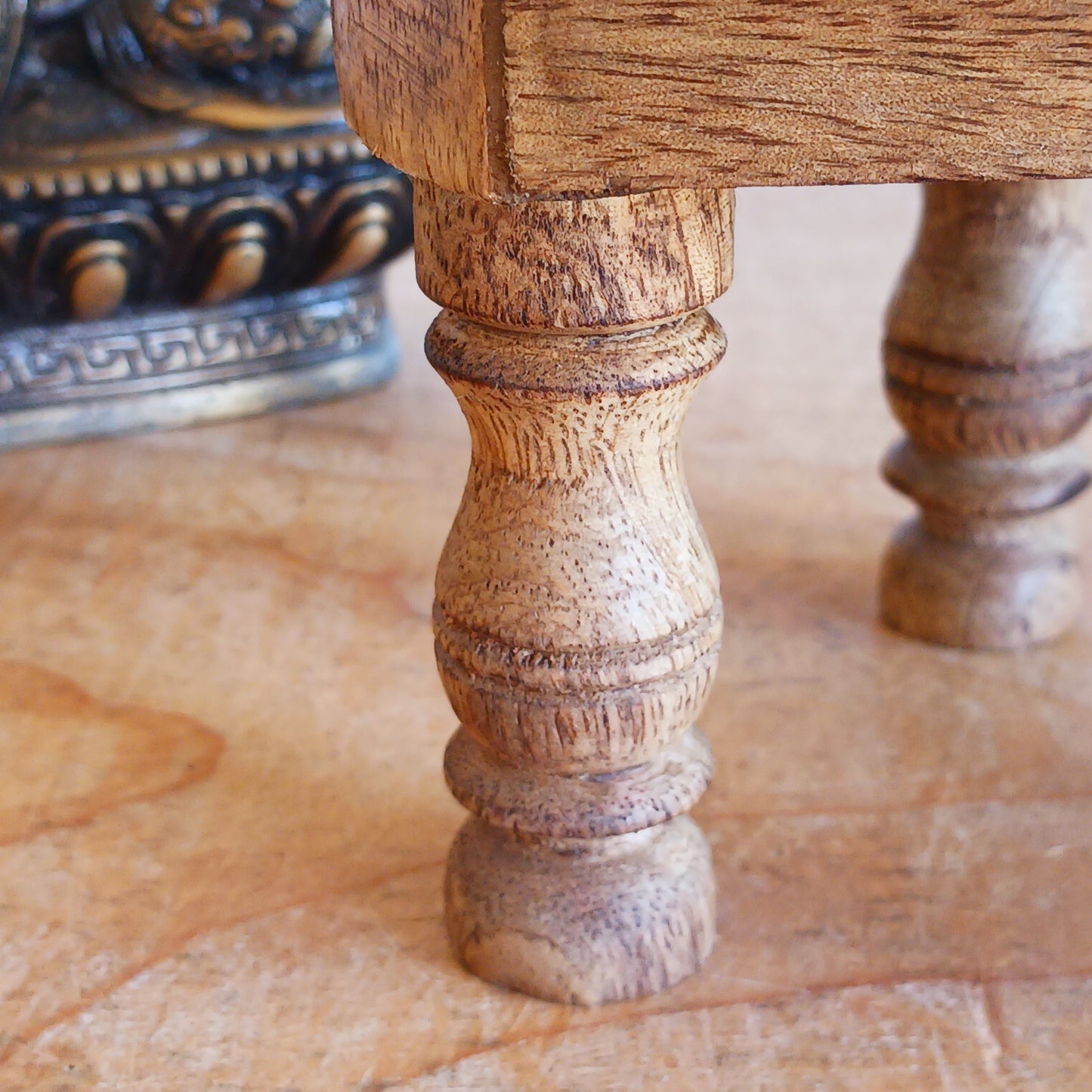 Bring the beauty of sacred geometry into your space with these compact Flower of Life tables. Handcrafted from solid mango wood, each table features a finely engraved Flower of Life symbol on top – an ancient pattern representing the interconnectedness of all life. 