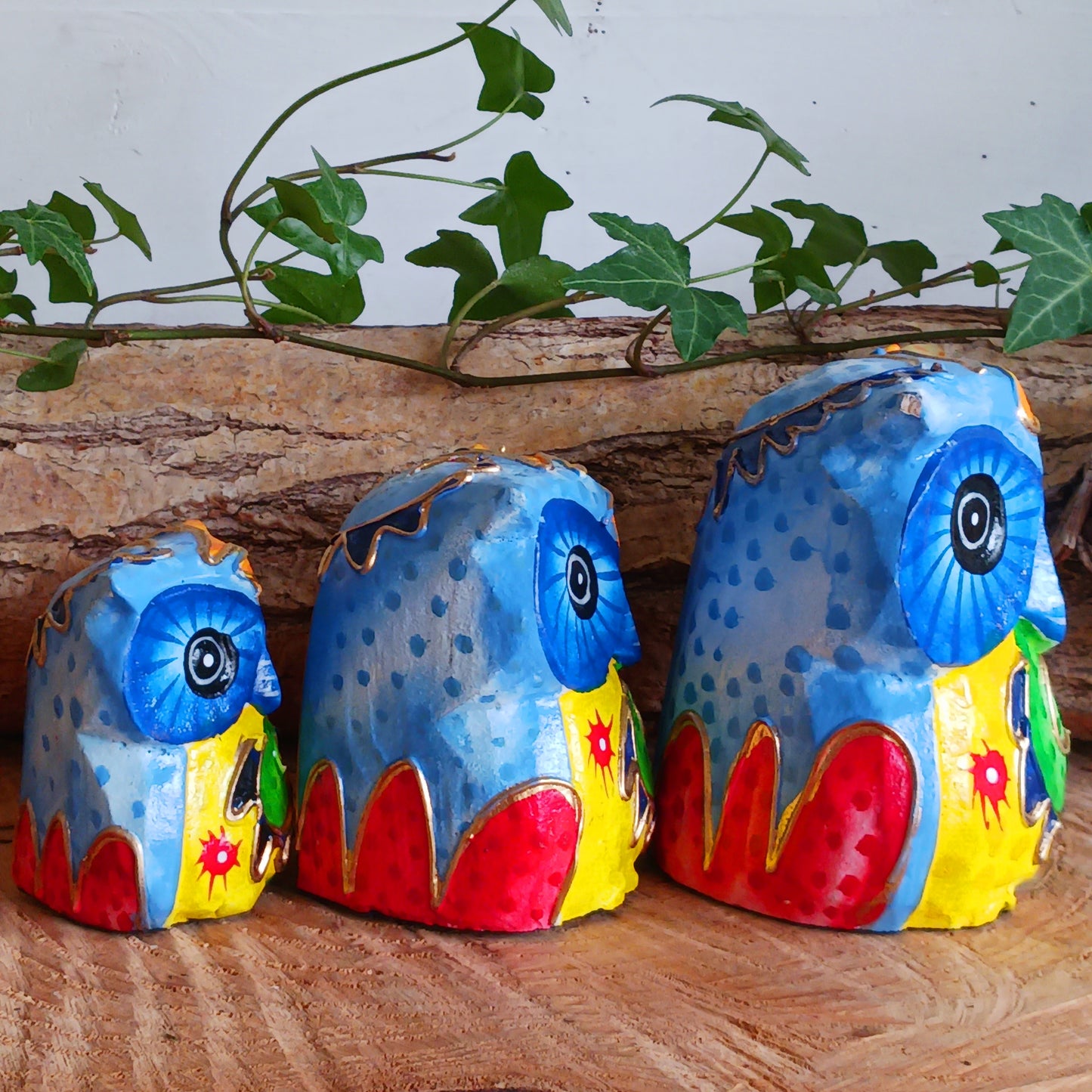 Add a pop of colour to your home décor with these beautifully hand painted Psychedelic Owls. These vibrant and quirky owl figurines instantly brighten any room with their playful charm.