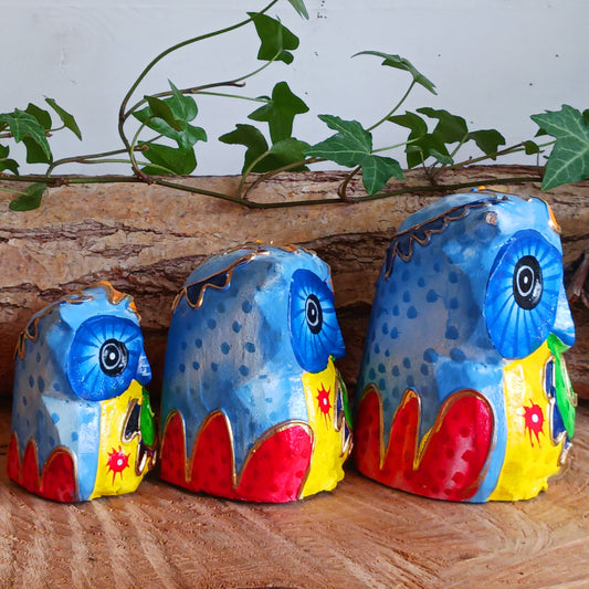 Add a pop of colour to your home décor with these beautifully hand painted Psychedelic Owls. These vibrant and quirky owl figurines instantly brighten any room with their playful charm.