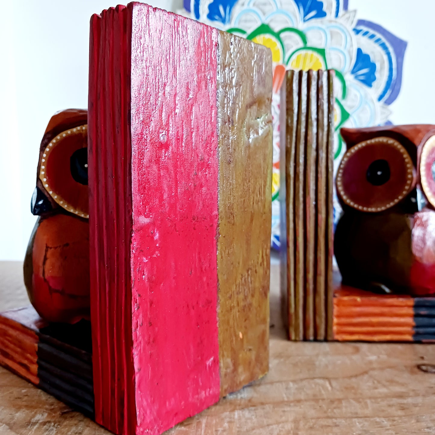 Add a touch of fun and charm to your bookshelf with these beautifully hand painted wooden owl bookends. These lovely bookends are designed to keep your books neatly organised, and the owls feature intricate detailing and colour that will bring personality and warmth to any space in your home.