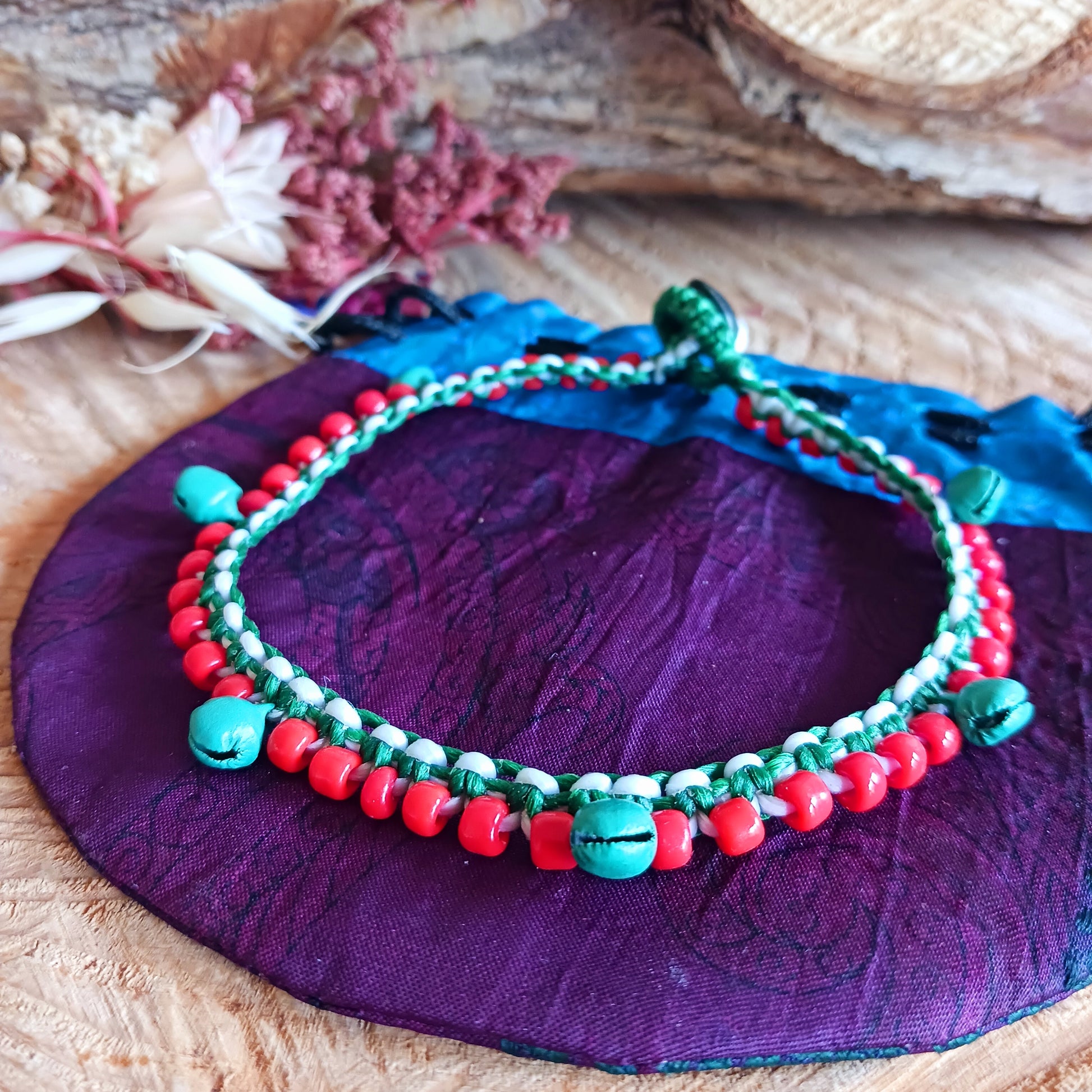 Add a playful touch to your look with these beautifully handmade Fairtrade jingle anklets from Thailand. Designed to bring both style and charm, each anklet features vibrant colours that instantly brighten any outfit.