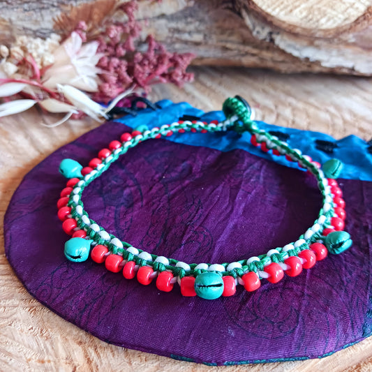 Add a playful touch to your look with these beautifully handmade Fairtrade jingle anklets from Thailand. Designed to bring both style and charm, each anklet features vibrant colours that instantly brighten any outfit.