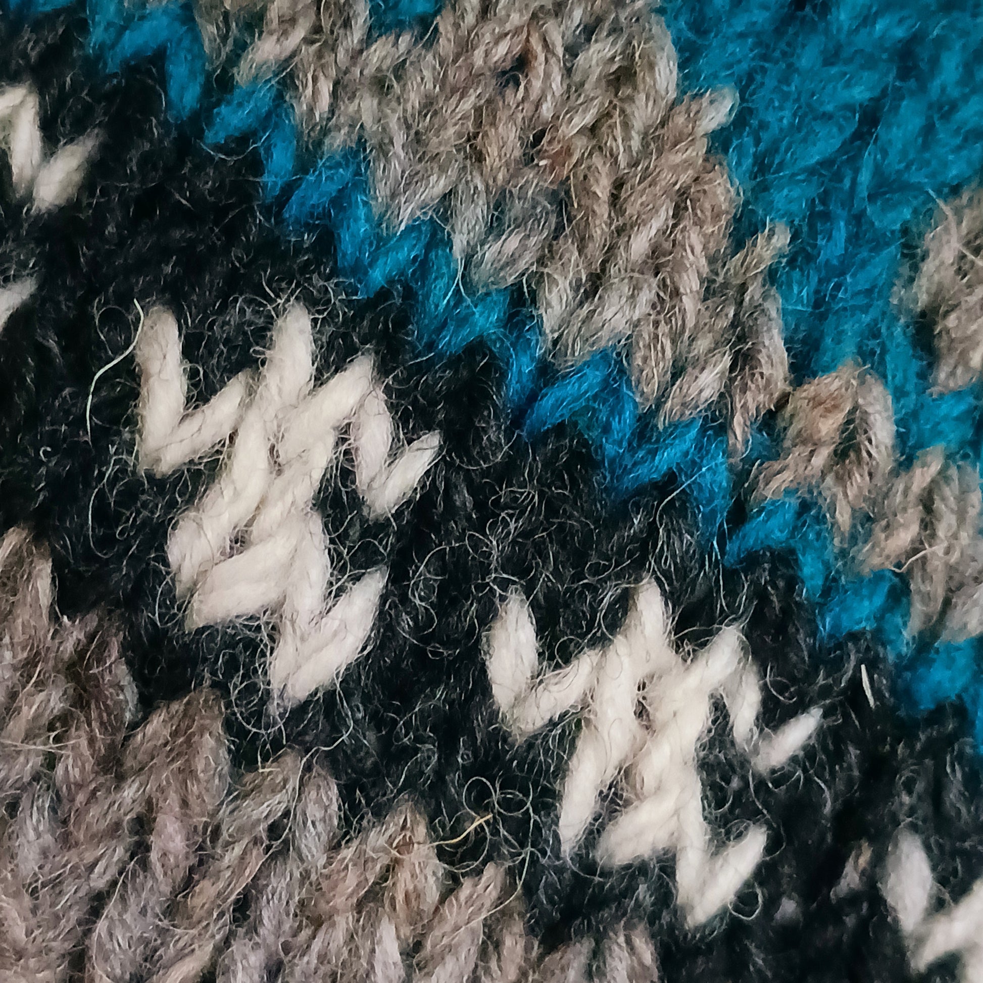 Stay cozy and stylish with our handmade chunky wool earflap hats, crafted in Nepal by skilled women artisans in Kathmandu. Each hat is 100% pure wool and features a soft polar fleece lining for extra warmth and comfort. Perfect for cold winter days, outdoor adventures, or adding a touch of handmade charm to your look.