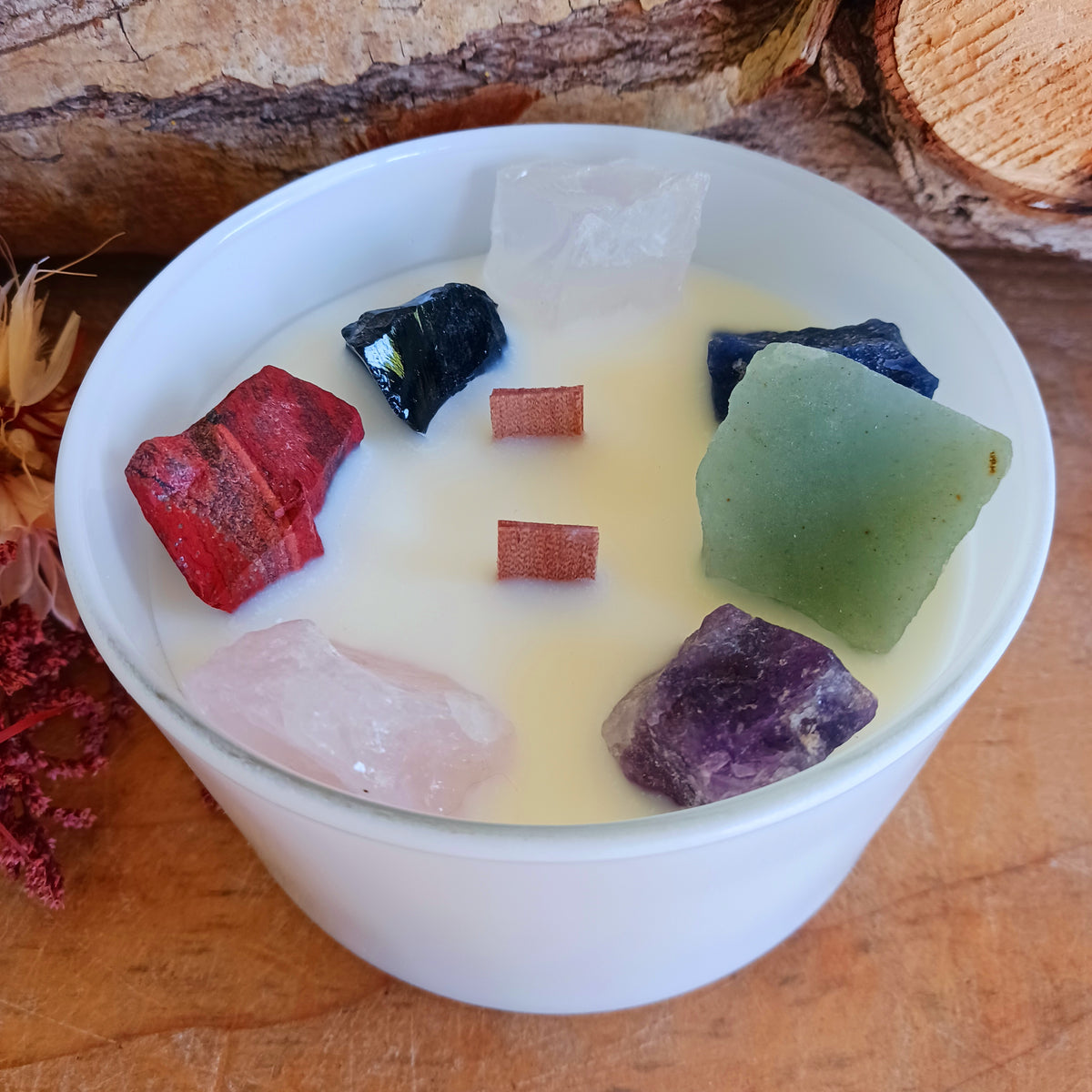 Create a calming and harmonious atmosphere with this beautiful Seven Chakra Gemstone Candle, a mystical blend of fragrance, colour and natural gemstones designed to represent the energy of the seven chakras.