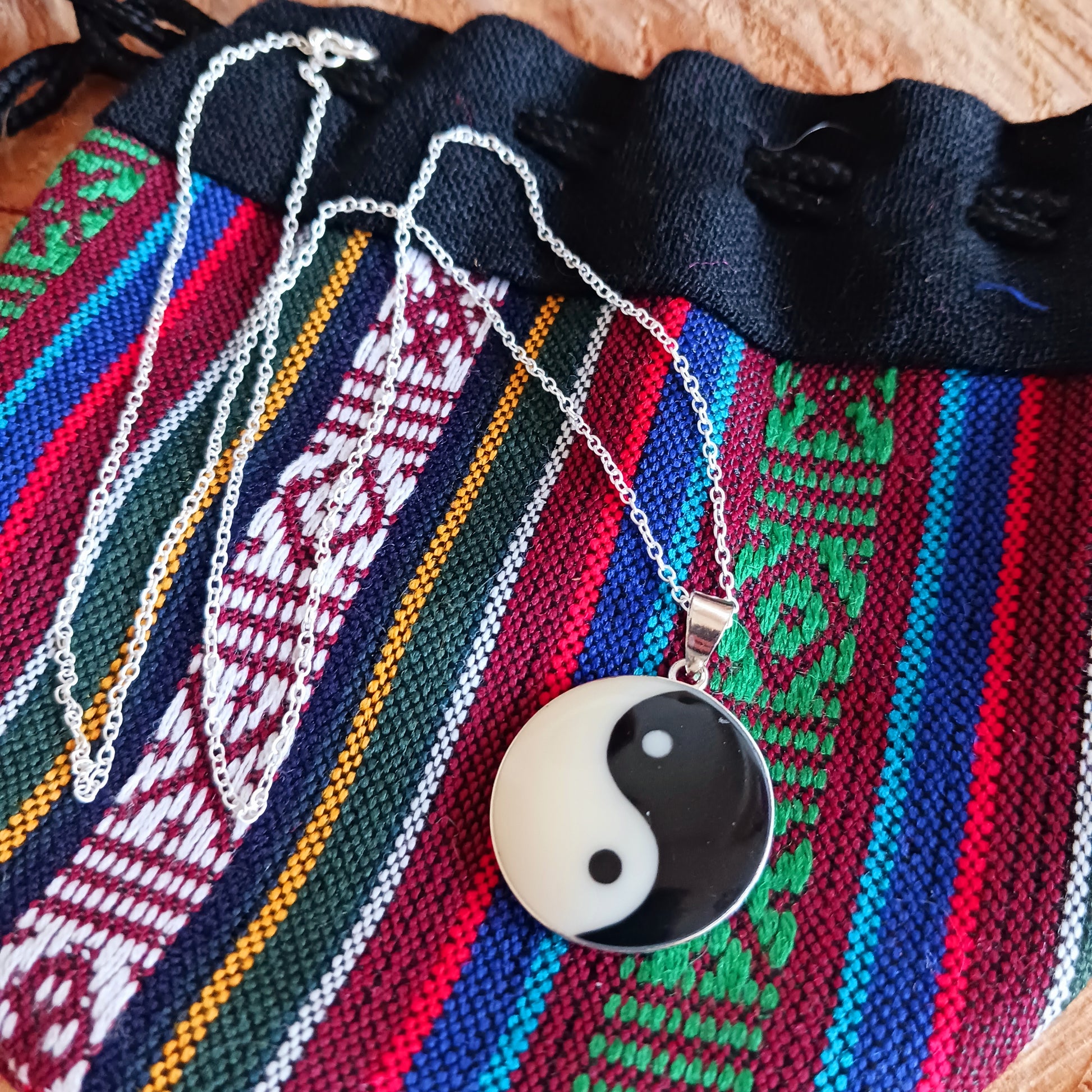This sterling silver Yin Yang pendant on a silver chain is intended to balance the mind.  Handcrafted for durability and designed to last a lifetime.