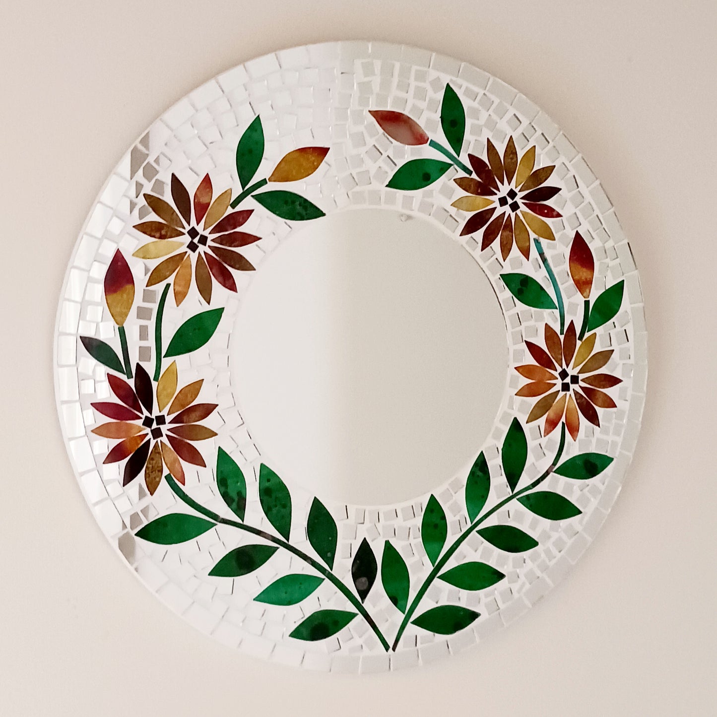 Transform any room into a vibrant oasis with our large Handmade Mosaic Floral Mirror. Crafted with care, this stunning mirror features a bright floral mosaic design that instantly adds style and colour to your décor. Perfect as a statement piece for living rooms, bedrooms, hallways, or entryways, it reflects not only light but also personality. Each mirror is uniquely handmade, making it a one-of-a-kind addition to your home.
