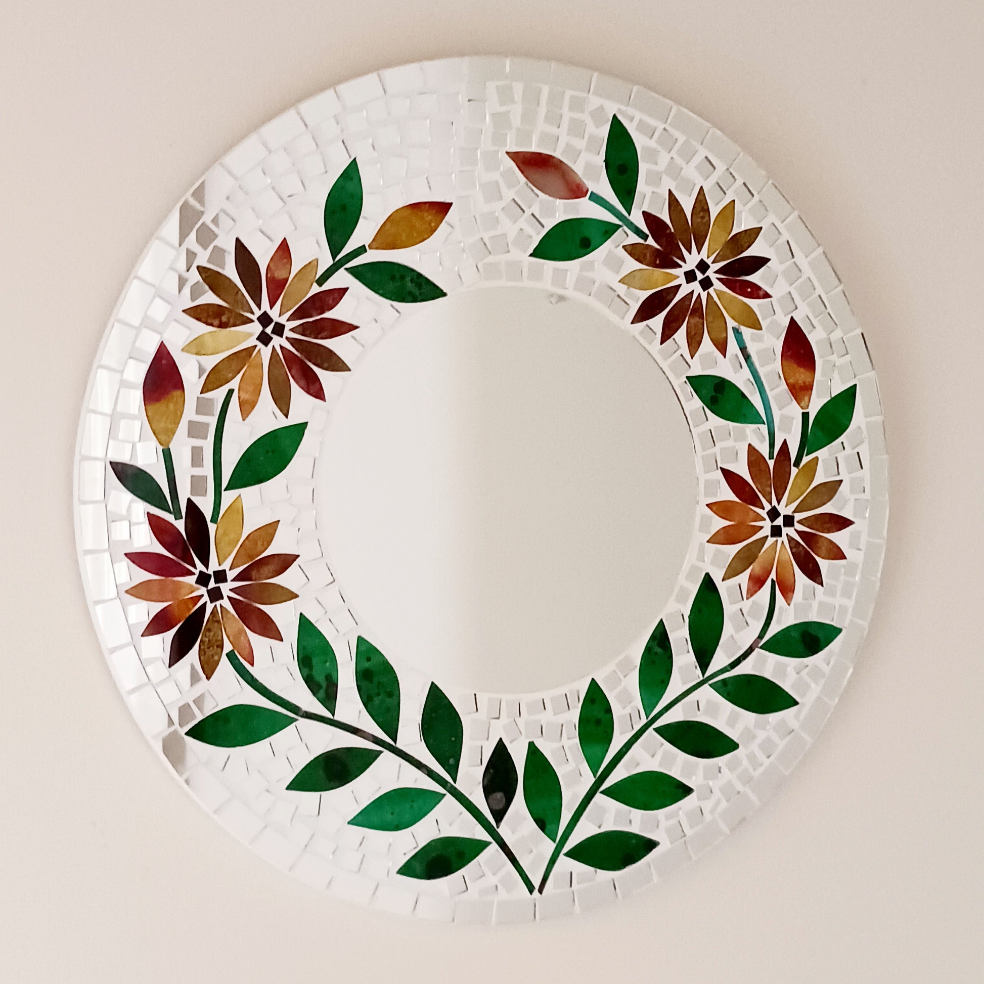 Transform any room into a vibrant oasis with our large Handmade Mosaic Floral Mirror. Crafted with care, this stunning mirror features a bright floral mosaic design that instantly adds style and colour to your décor. Perfect as a statement piece for living rooms, bedrooms, hallways, or entryways, it reflects not only light but also personality. Each mirror is uniquely handmade, making it a one-of-a-kind addition to your home.