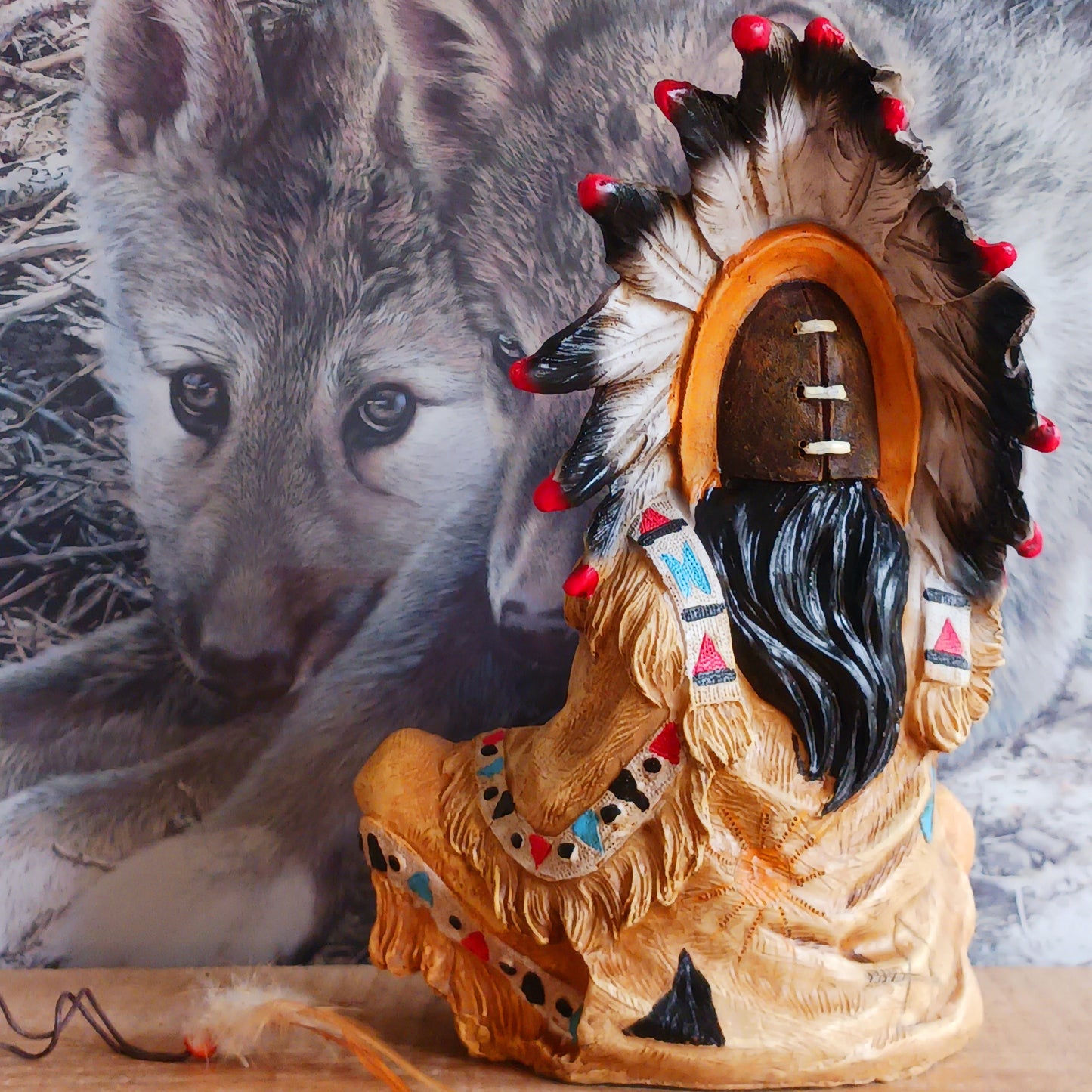 Elevate your space with the serene elegance of this Native American Chief Smoking a Peace Pipe figurine, a captivating symbol of wisdom and cultural harmony. Expertly crafted with intricate detail, this masterpiece depicts a noble chief in traditional tribal attire, smoking a symbolic peace pipe with grace and dignity. From the regal feathered headdress to the delicate carving of the pipe, every element reflects the artistry and cultural depth of Native American traditions. 