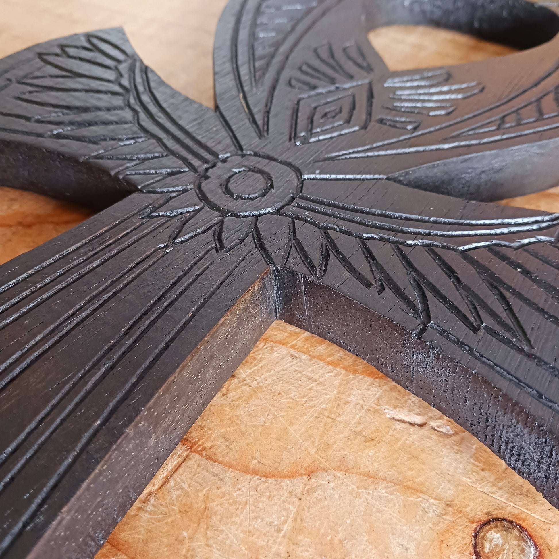 This beautiful and intricately carved wall plaque features a traditional symbol of the ancient Egyptians. The ankh is often interpreted as a symbol of life and eternal existence. Its looped top is thought to represent the eternal soul, while the straight line below symbolises the earthly plane or physical existence. Together, they signify the eternal cycle of life, death, and rebirth.