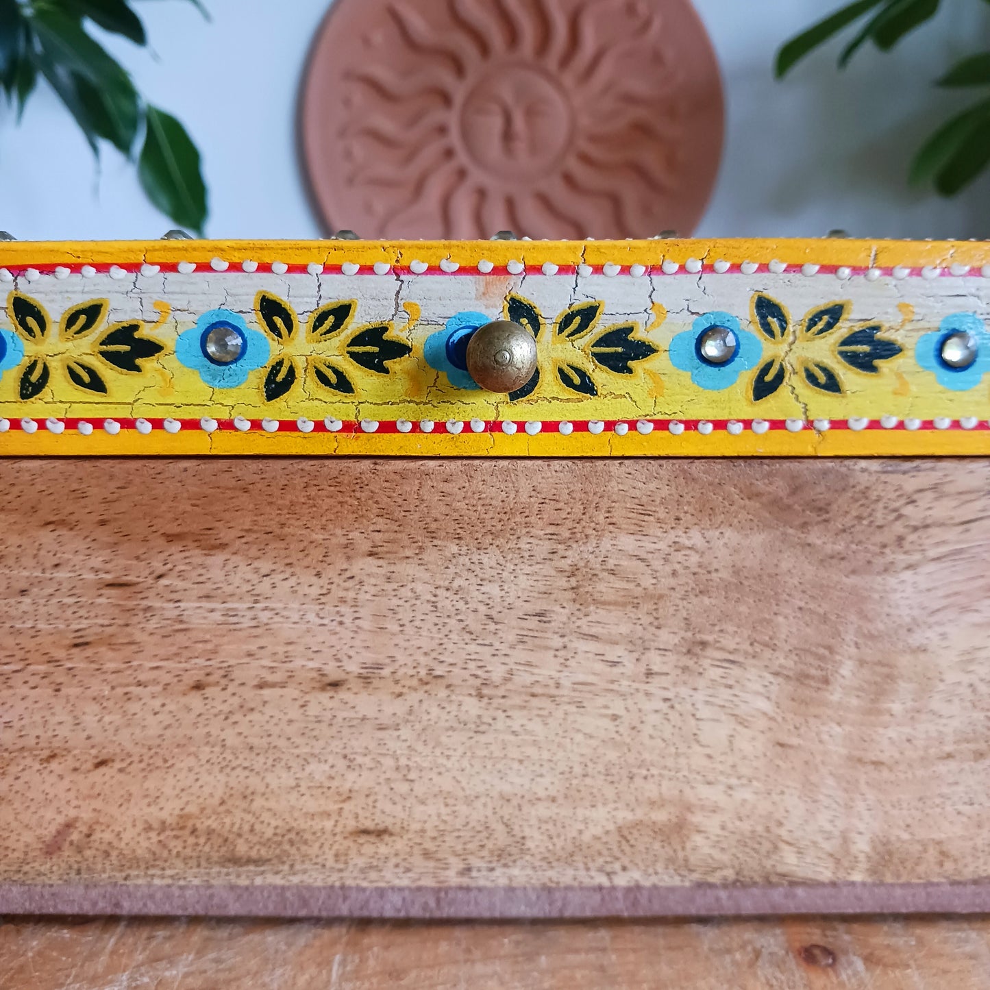 Elevate your home décor with the Zaha Large Decorative Box, a beautifully handcrafted storage piece made from sustainable mango wood. Expertly handmade and artistically hand-painted, this stunning box features intricate floral detailing on the lid and is finished with an elegant gold-coloured knob for a refined touch.