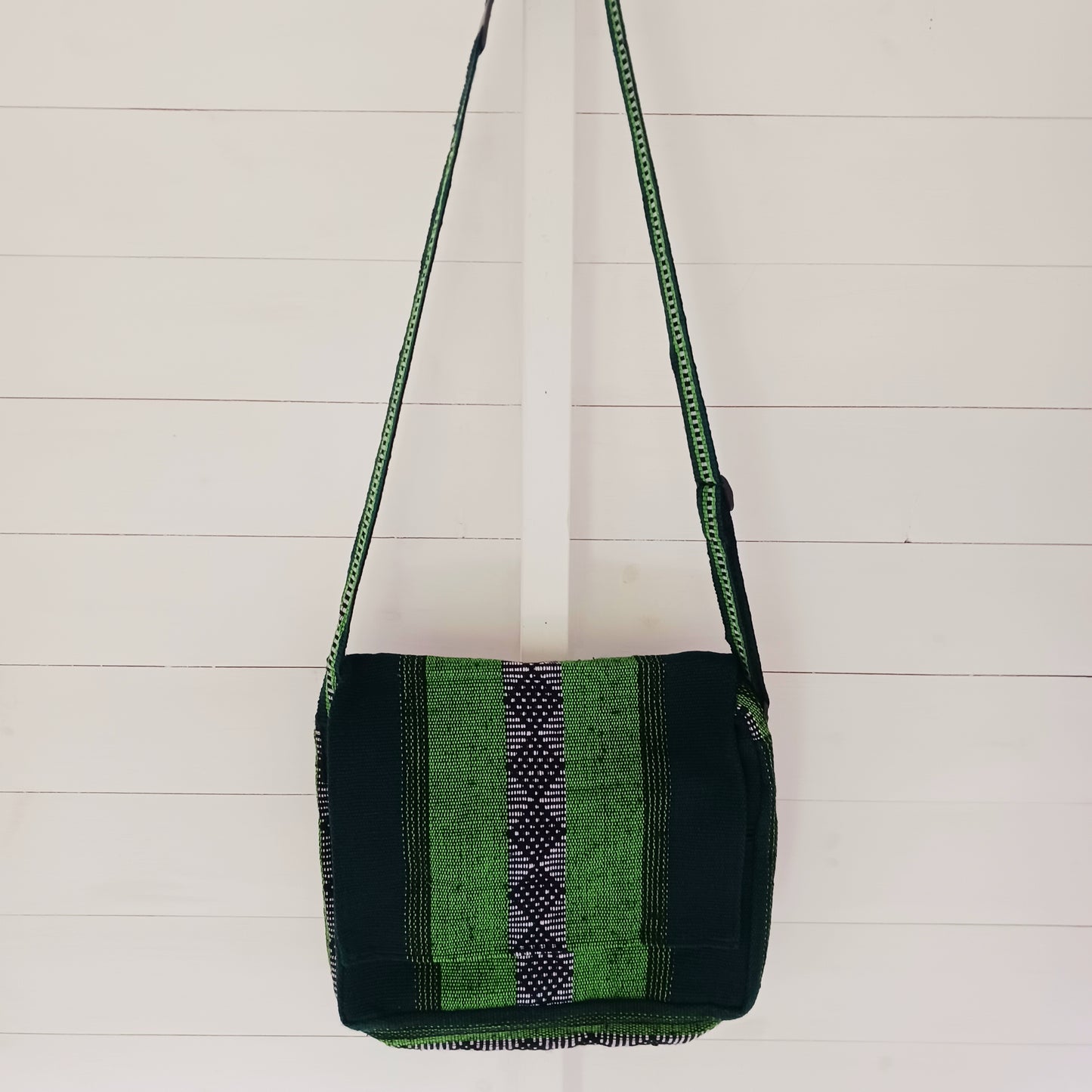 Inspired by the Spanish word for "colourful," this Vistoso Satchel brings vibrant style and practical design together. Available in a variety of bold and eye-catching patterns, this satchel comes in lovely shades of green and is both fashionable and functional. The spacious main zipped compartment comfortably fits a small laptop or notebook, while the additional front zipped pocket keeps essentials within easy reach.