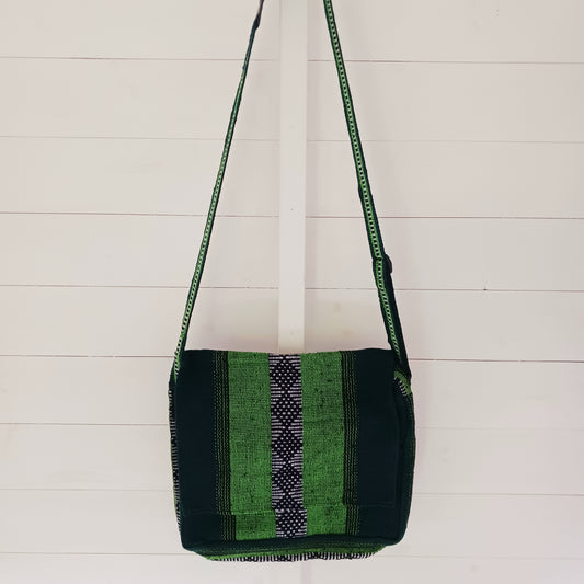 Inspired by the Spanish word for "colourful," this Vistoso Satchel brings vibrant style and practical design together. Available in a variety of bold and eye-catching patterns, this satchel comes in lovely shades of green and is both fashionable and functional. The spacious main zipped compartment comfortably fits a small laptop or notebook, while the additional front zipped pocket keeps essentials within easy reach.
