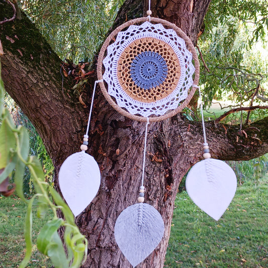 Bring peace, balance, and natural elegance into your home with this handmade large brown Elemental Spirits Dream Catcher. Crafted with love and care on the spiritually blessed island of Bali, this vegan-friendly piece is made entirely from natural materials, free of feathers. Its earthy tones and organic textures create a warm and grounding presence, perfect for bedrooms, meditation spaces, or as a thoughtful gift.