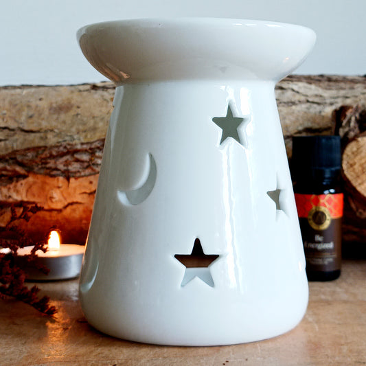 Large ceramic white oil burner, great for use with fragrance oils, essential oils and wax melts. It also makes a very attractive decoration in any room, due to the beautiful white ceramic. The oil burner has a pretty moon and stars design which allows the candle light to shine through creating that relaxing atmosphere.