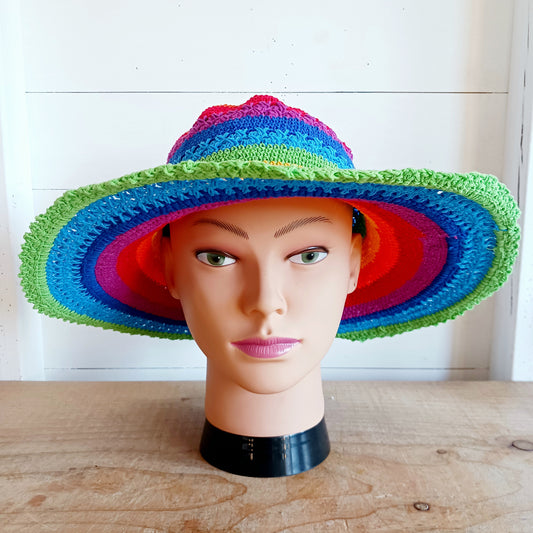 This lovely crochet cotton summer sun hat is perfect for summertime with it's vibrant rainbow colours. Each hat has a malleable wire woven into the rim to help keep the shape. Ideal for holidays and festivals.
