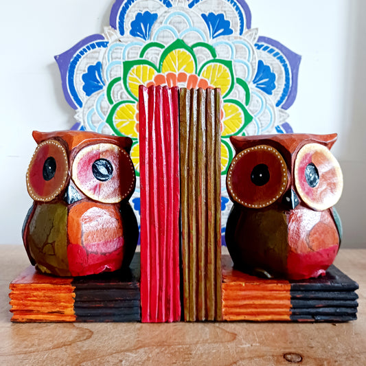 Add a touch of fun and charm to your bookshelf with these beautifully hand painted wooden owl bookends. These lovely bookends are designed to keep your books neatly organised, and the owls feature intricate detailing and colour that will bring personality and warmth to any space in your home.