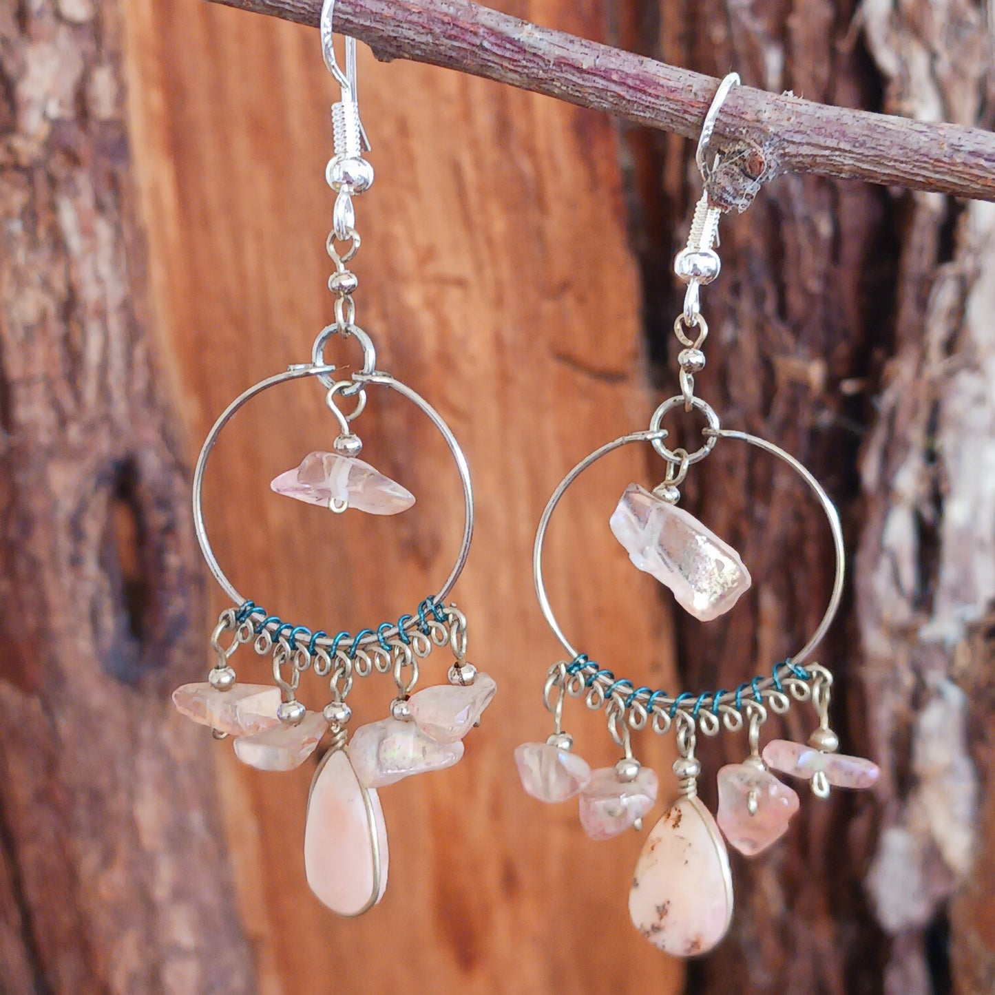 Add a touch of bohemian beauty to your look with these handmade Peruvian stone earrings. Featuring rose quartz stones and finished with silver-plated hooks, each pair is carefully crafted in small workshops in Peru.