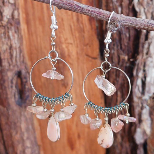 Add a touch of bohemian beauty to your look with these handmade Peruvian stone earrings. Featuring rose quartz stones and finished with silver-plated hooks, each pair is carefully crafted in small workshops in Peru.