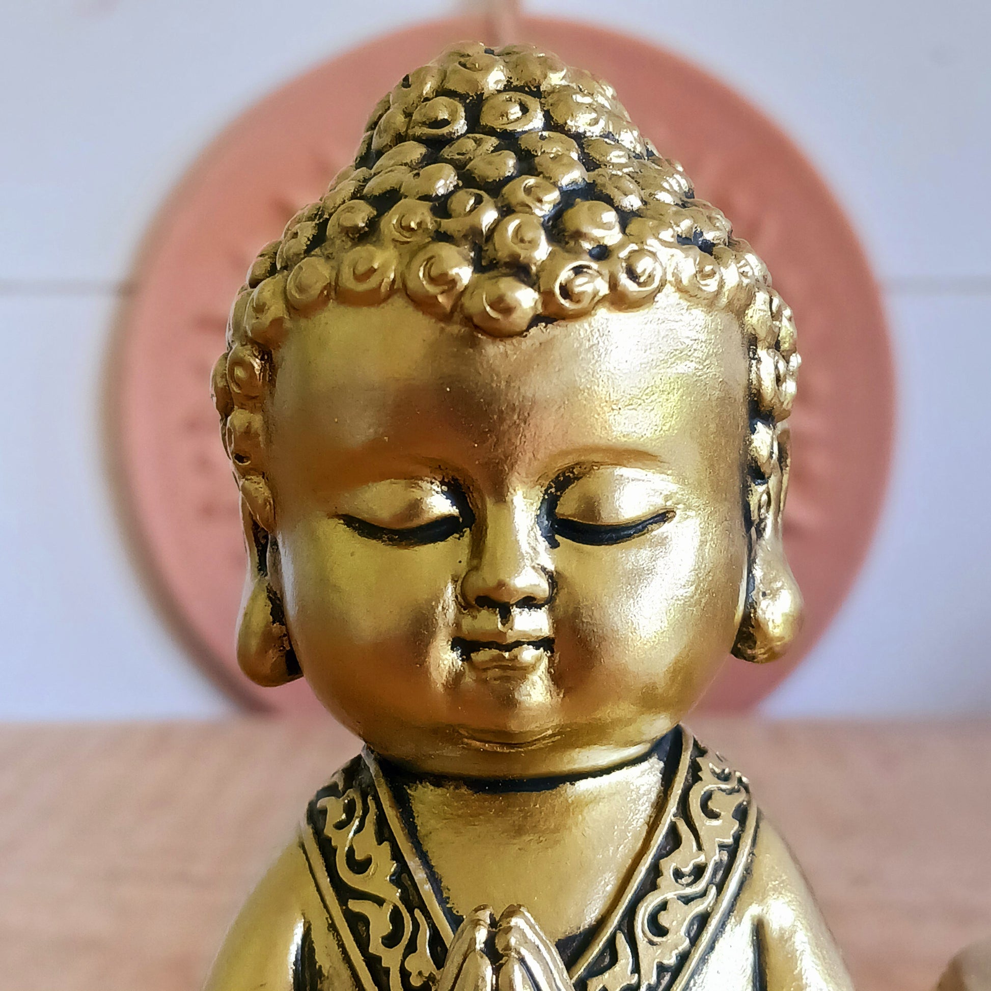Bring a sense of peace and mindfulness into your home with this elegant Gold Buddha Tealight Candle Holder. Featuring a beautifully crafted praying Buddha figure alongside a tealight holder, this decorative piece creates a calming ambiance wherever it is placed.