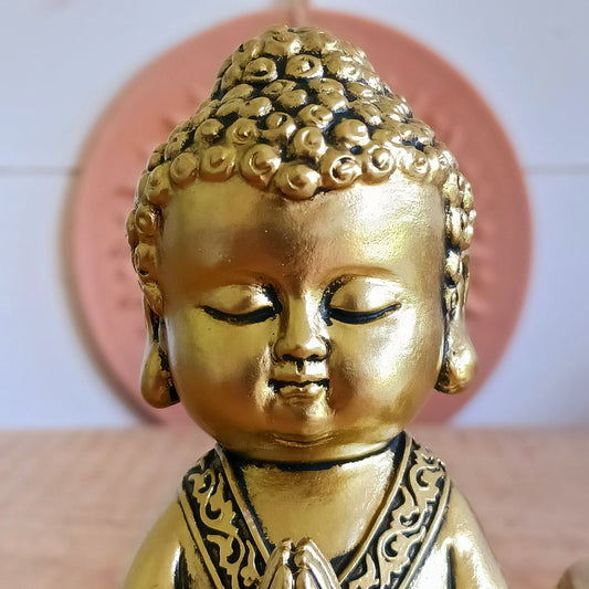 Bring a sense of peace and mindfulness into your home with this elegant Gold Buddha Tealight Candle Holder. Featuring a beautifully crafted praying Buddha figure alongside a tealight holder, this decorative piece creates a calming ambiance wherever it is placed.