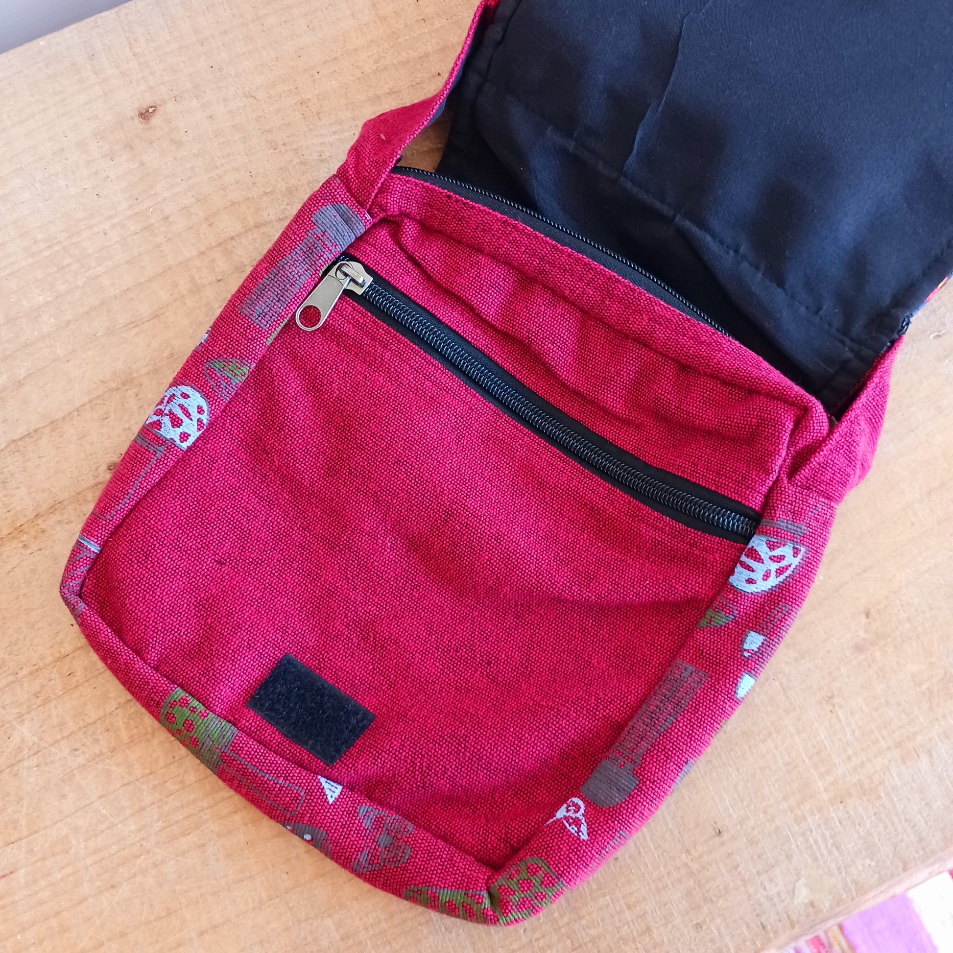 This lovely Yin Yang shoulder bag is both practical and unusual. There are three zipped compartments ensuring you keep your valuables safe. The Yin Yang design on the front is set in a colourful mandala on the flap, and this is secured with a velcro strips. The staps are adjustable to suit your style.