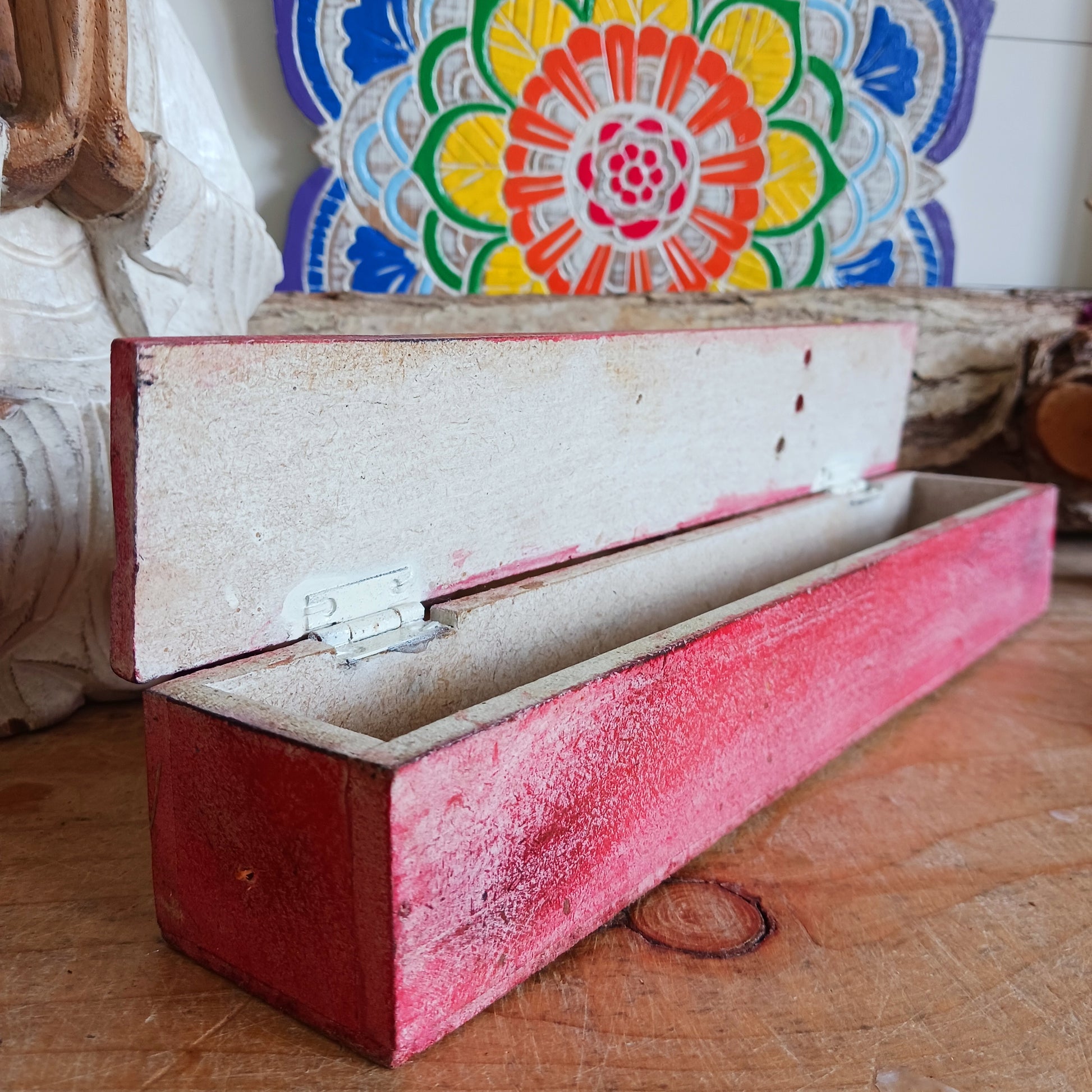 This unique incense stick holder is perfect to catch the ash from your favourite incense. It has been handmade from responsibly sourced wood and beautifully decorated with a handcarved Buddha head.