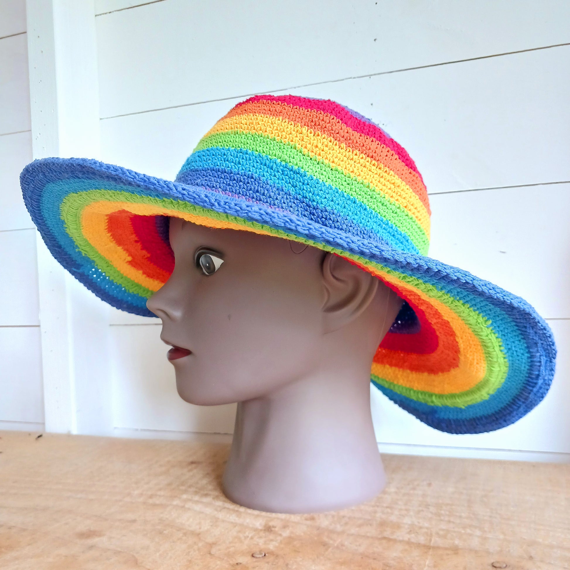 Brighten up your summer with this vibrant handmade crochet cotton sun hat! Featuring a stunning rainbow pattern, this unique hat is perfect for holidays, beach days, and festivals.