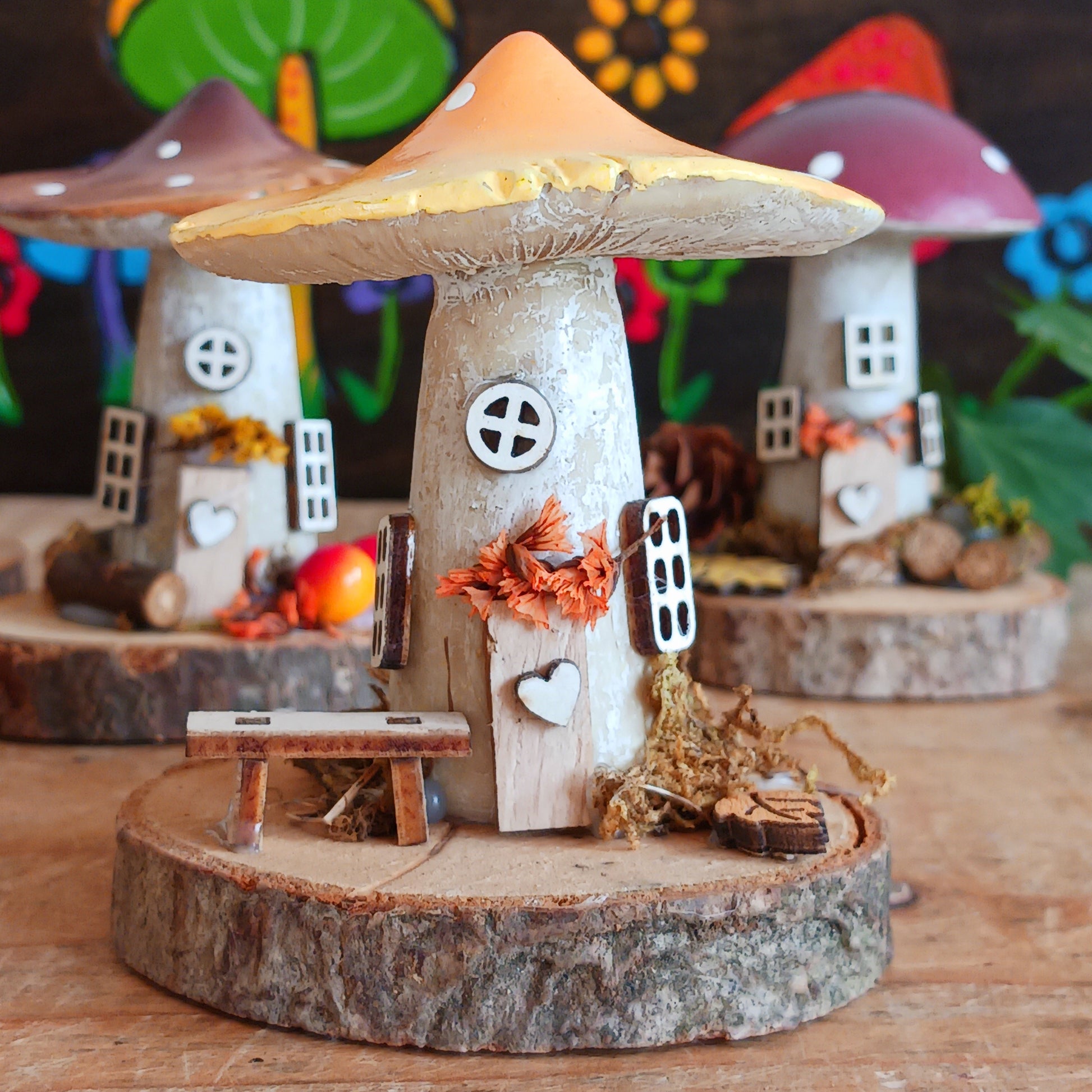 Add a whimsical touch to your home with these charming folk art mushroom cottages. Perfect for all occasions, these handcrafted ornaments are made from high-quality polystone and wood, featuring delightful details and a rustic base made from natural wood slices. Whether placed on a shelf, desk, or windowsill, these miniature cottages bring warmth and personality to any space. Ideal for gifting or as a unique addition to your home décor collection.