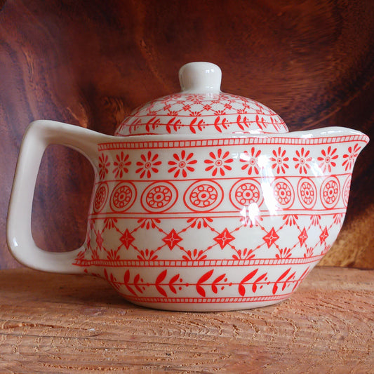 Add timeless elegance to any tea ritual with this Small Herbal Teapot featuring a stunning Amber pattern design. Inspired by traditional Eastern aesthetics, this beautifully crafted teapot blends cultural symbolism with everyday functionality, making it an exceptional gift.