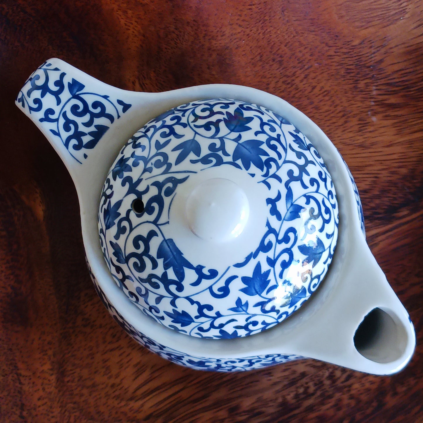 Add timeless elegance to any tea ritual with this Small Herbal Teapot featuring a stunning blue pattern design. Inspired by traditional Eastern aesthetics, this beautifully crafted teapot blends cultural symbolism with everyday functionality, making it an exceptional gift.