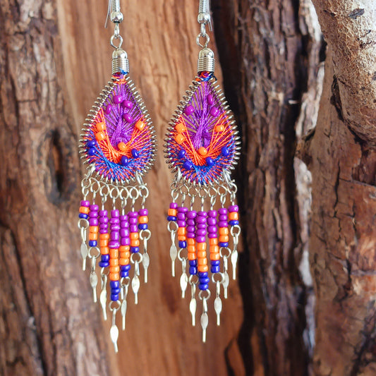 Lovingly handmade in small workshops in Peru, these colourful statement earrings are sourced from ethical, small family businesses. Traditional Peruvian patterns, colourful beads and contemporary details combine to create jewellery that is unique, individual and full of character.